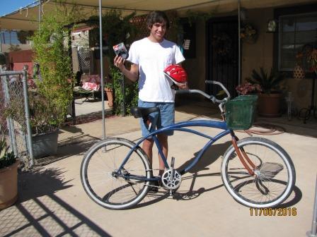 Eddie with his new bike, helmet, and lock